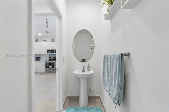 bathroom with tile patterned flooring