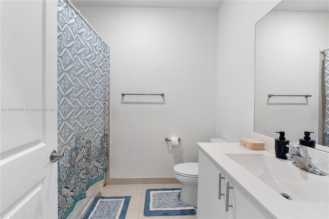 full bathroom with vanity, toilet, tile patterned flooring, and shower / bath combo