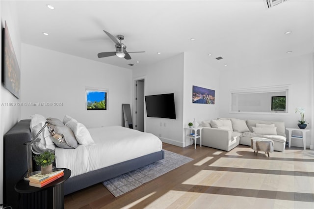 bedroom featuring ceiling fan and wood-type flooring