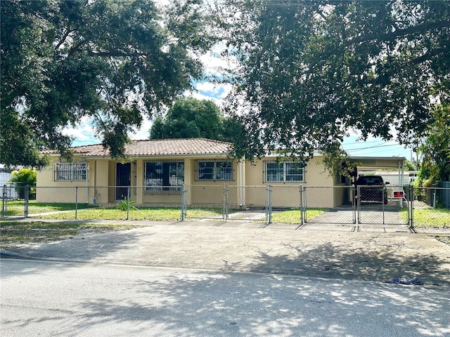 view of front of home featuring a carport