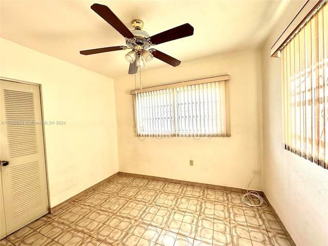 empty room featuring ceiling fan