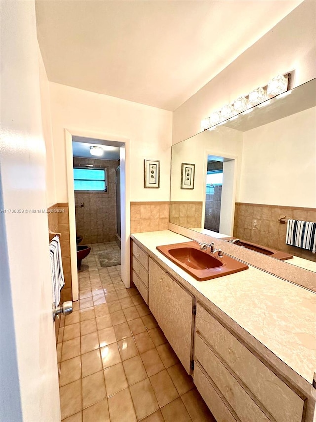 bathroom with walk in shower, tile patterned flooring, toilet, vanity, and tile walls