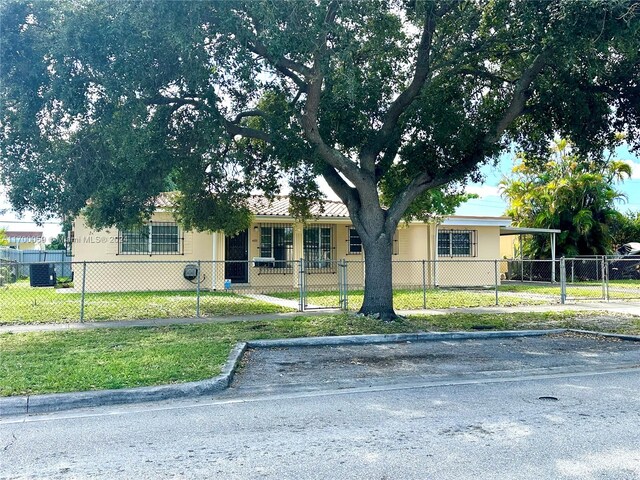 view of front of property featuring central air condition unit