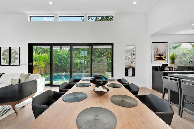 dining area featuring light wood-type flooring