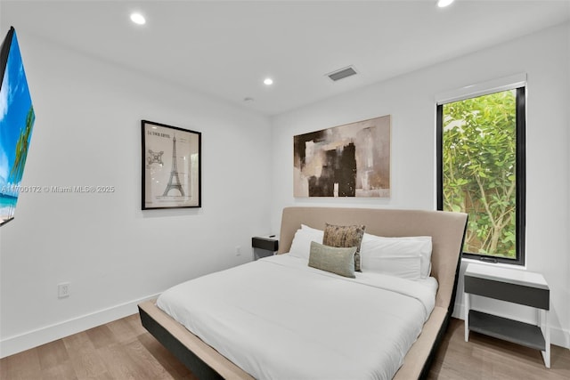 bedroom featuring light hardwood / wood-style flooring