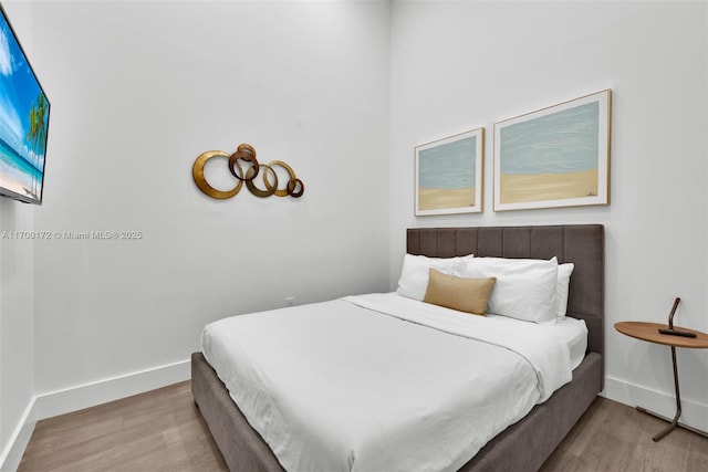 bedroom featuring light hardwood / wood-style flooring