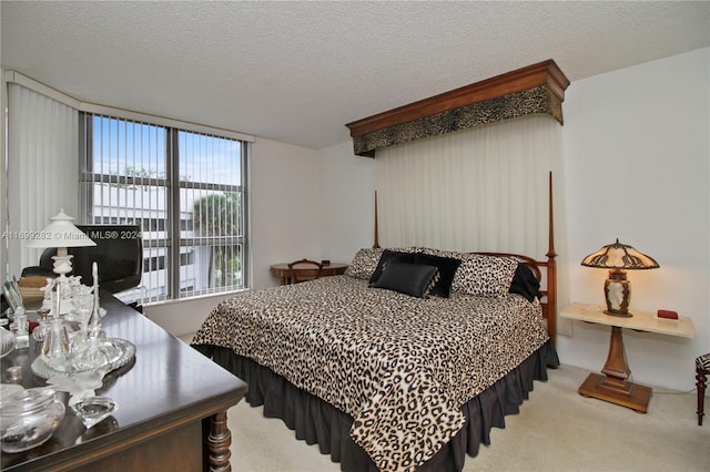 carpeted bedroom with a textured ceiling