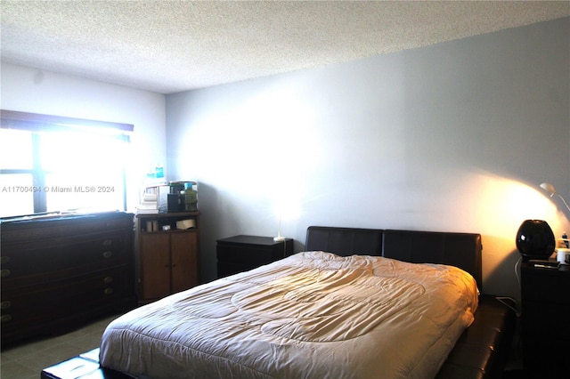 bedroom featuring a textured ceiling