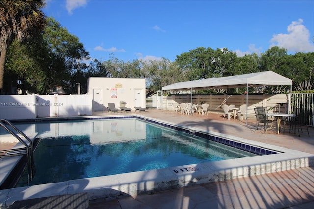 view of swimming pool featuring a patio