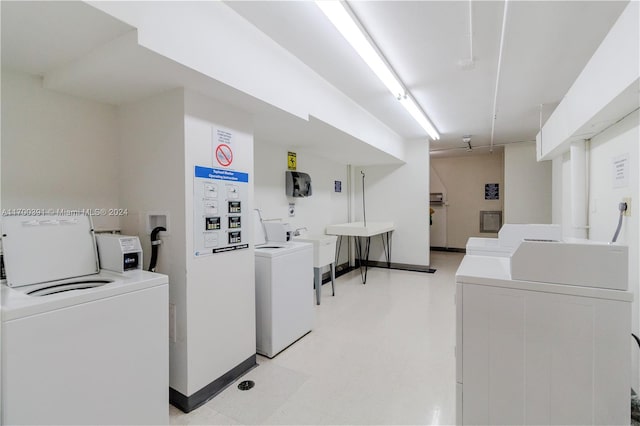 laundry area featuring washing machine and dryer