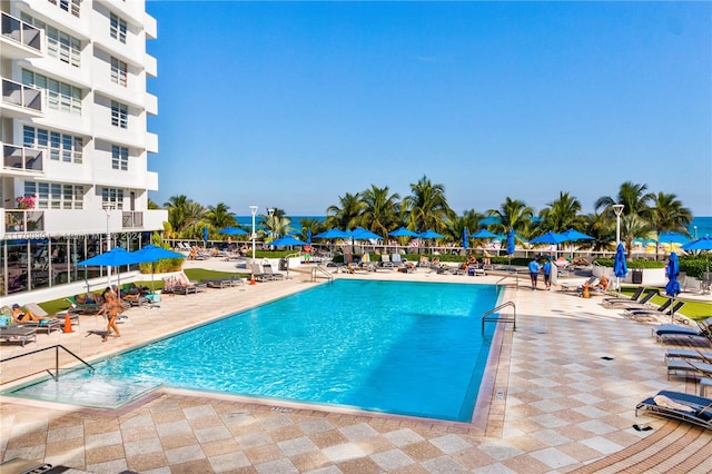 view of swimming pool featuring a patio