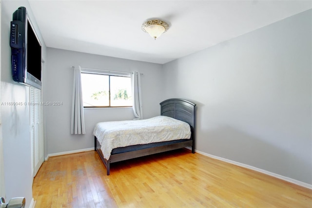 bedroom featuring hardwood / wood-style floors