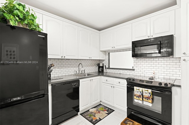 kitchen featuring black appliances, backsplash, white cabinets, and sink