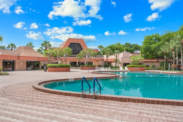 view of pool featuring a patio area