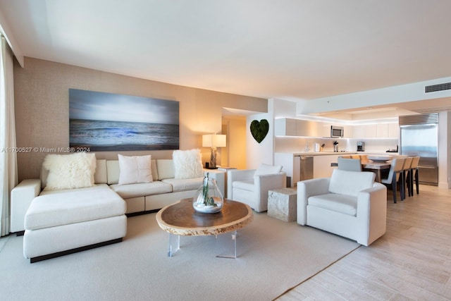 living room with light wood-type flooring