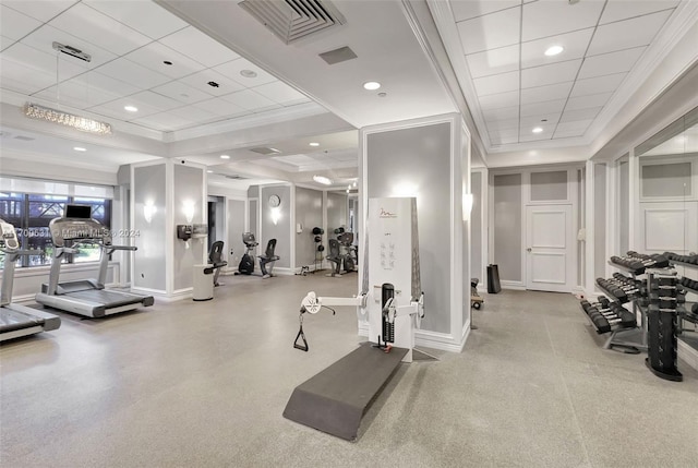 exercise room featuring ornamental molding