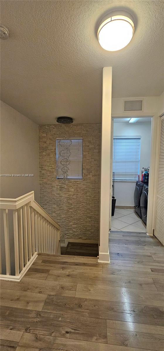 bedroom featuring wood-type flooring and ceiling fan