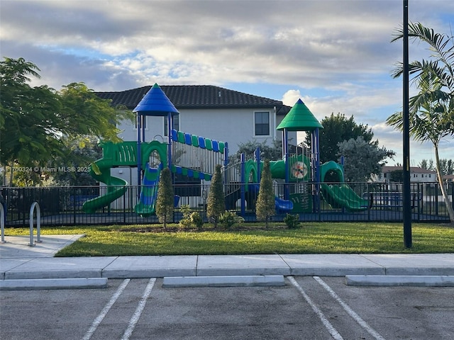 view of jungle gym featuring a yard