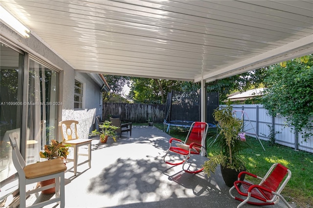 view of patio featuring a trampoline