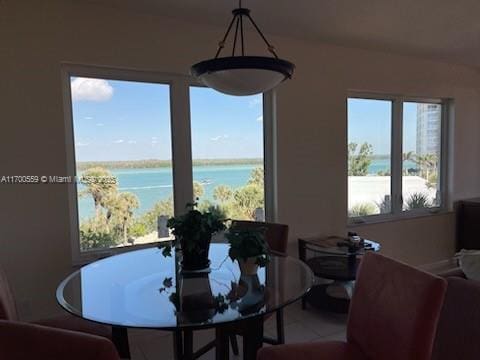 dining area with a water view