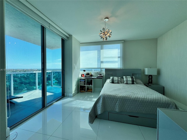 bedroom with access to outside, an inviting chandelier, and light tile patterned flooring