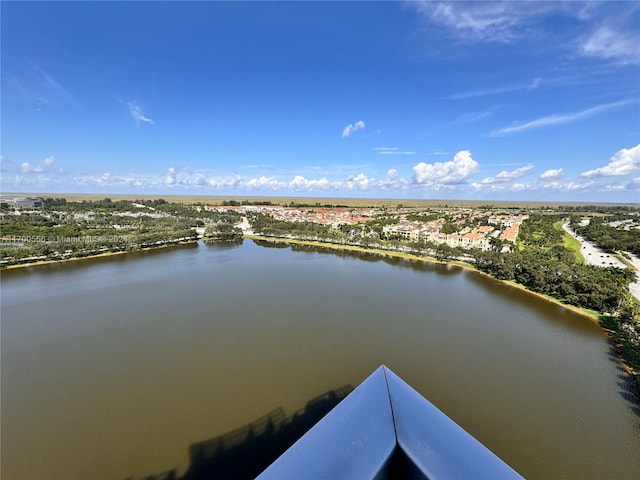 drone / aerial view with a water view