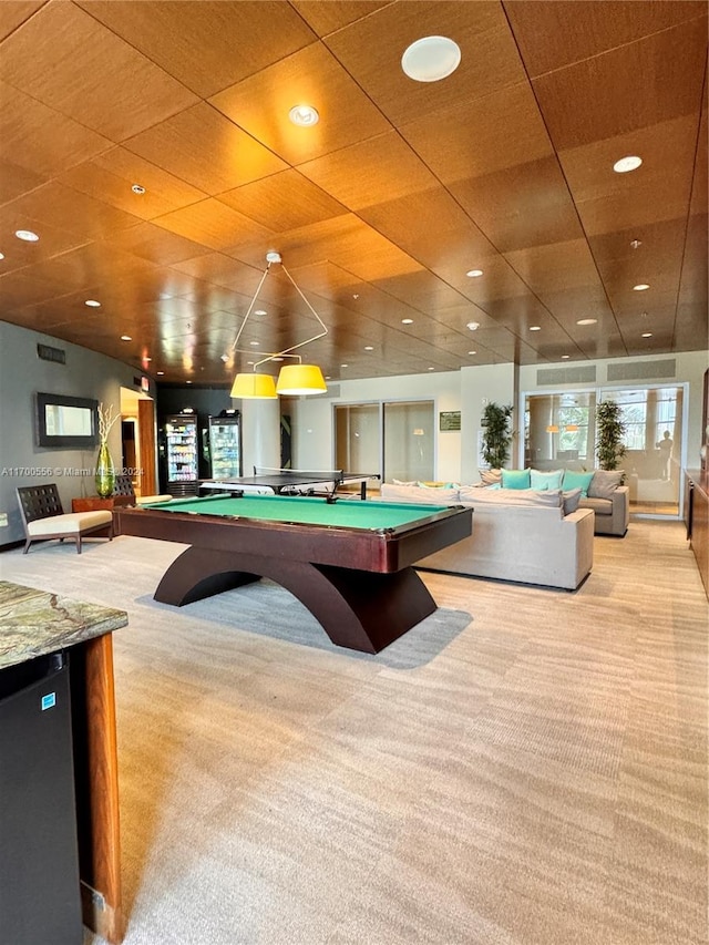 recreation room with light carpet and billiards