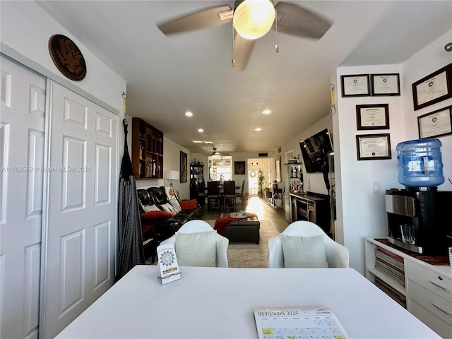 living room with ceiling fan