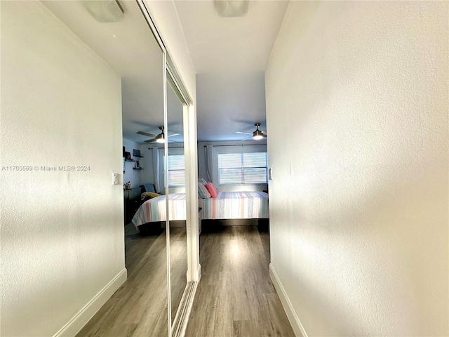 corridor featuring hardwood / wood-style flooring