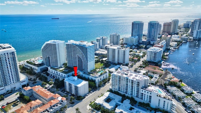 drone / aerial view with a water view