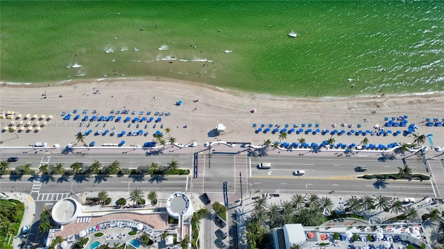 aerial view with a view of the beach and a water view