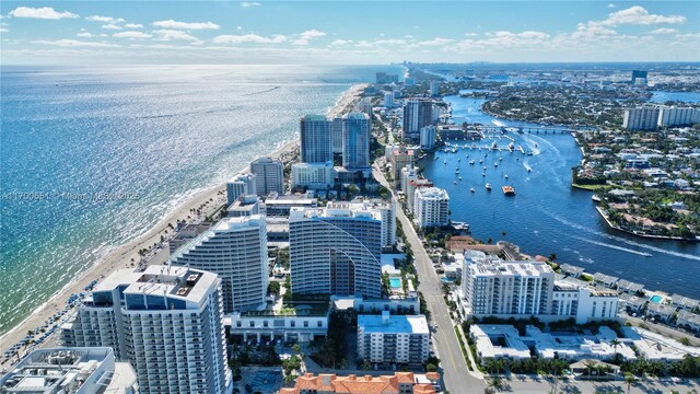 aerial view featuring a water view and a view of the beach