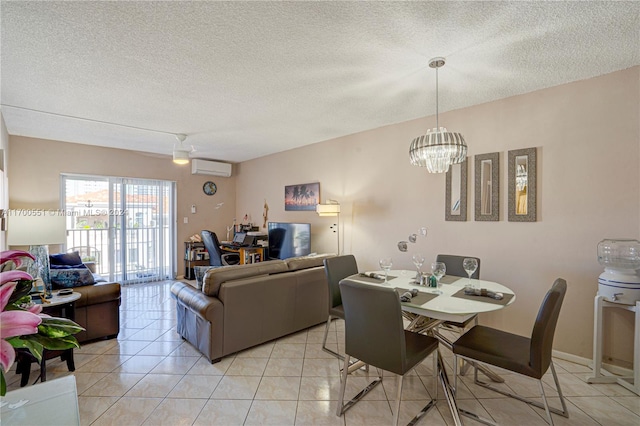 dining room featuring a wall mounted AC, ceiling fan with notable chandelier, light tile patterned floors, and a textured ceiling