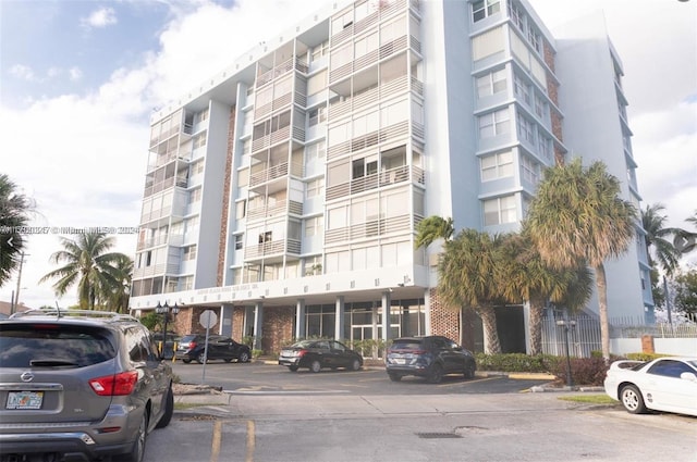 16850 S Glades Dr Unit 3C, North Miami Beach, FL 33162 - view of apartment building / complex featuring uncovered parking