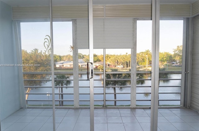 16850 S Glades Dr Unit 3C, North Miami Beach, FL 33162 - unfurnished sunroom featuring a water view and healthy amount of natural light
