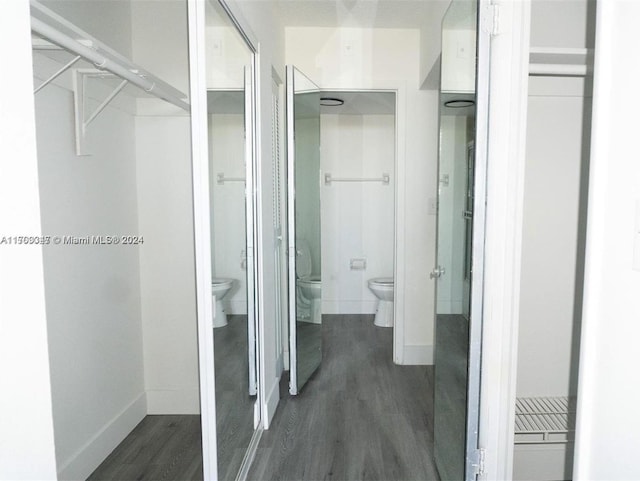 16850 S Glades Dr Unit 3C, North Miami Beach, FL 33162 - corridor featuring dark wood finished floors and baseboards