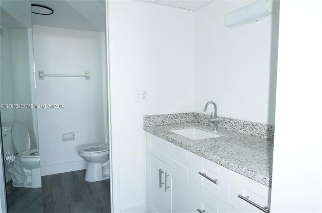 16850 S Glades Dr Unit 3C, North Miami Beach, FL 33162 - bathroom featuring vanity and wood finished floors