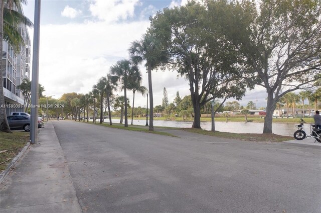 16850 S Glades Dr Unit 3C, North Miami Beach, FL 33162 - view of asphalt road featuring a water view