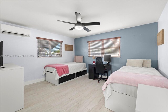 bedroom featuring light hardwood / wood-style floors and ceiling fan