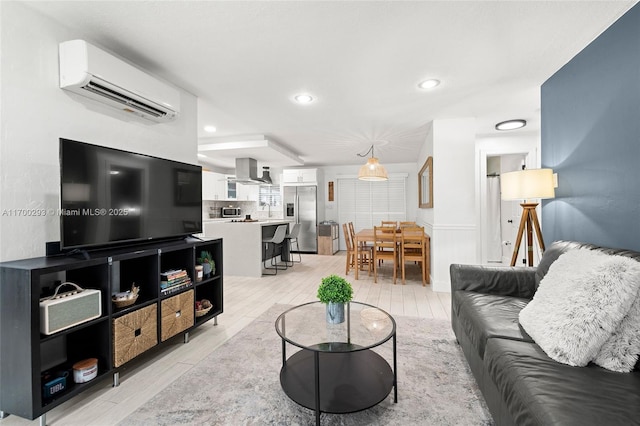 living room featuring a wall mounted air conditioner