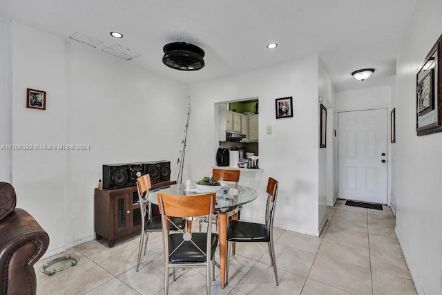 dining room featuring light tile patterned floors