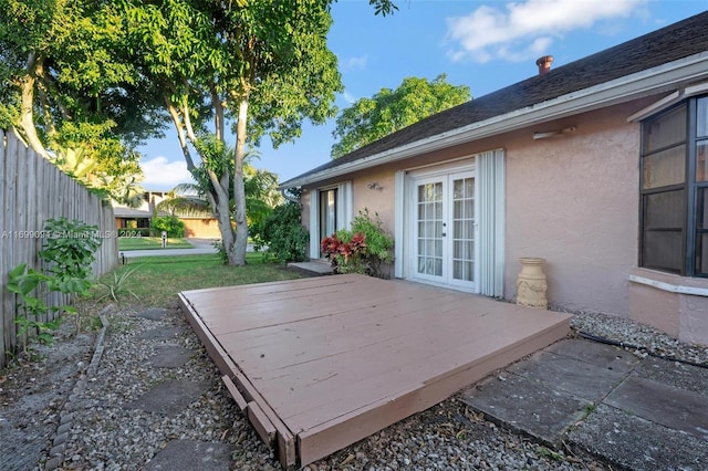 view of patio with a deck and french doors