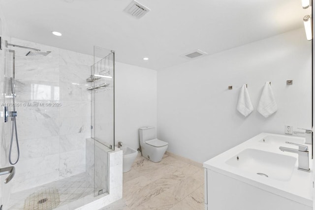 bathroom featuring tiled shower, vanity, and toilet