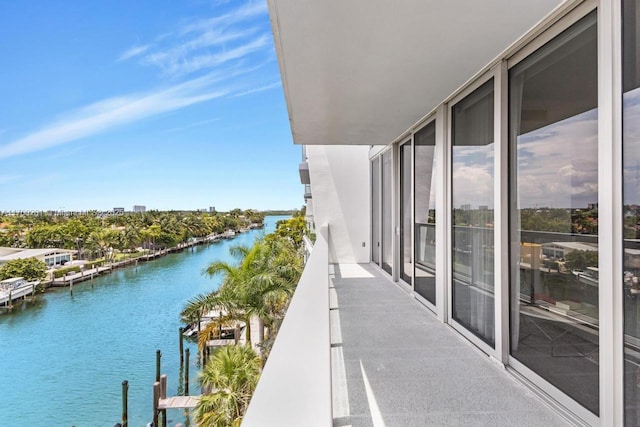 balcony featuring a water view