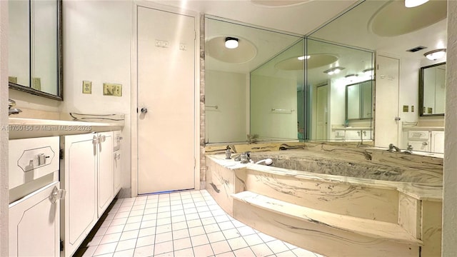 full bath with a garden tub, tile patterned flooring, visible vents, and vanity