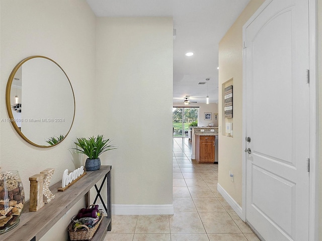 hallway with light tile patterned flooring