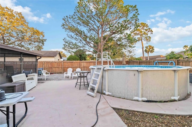 view of swimming pool featuring a patio