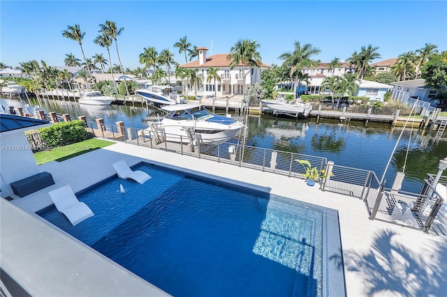 view of pool featuring a water view and a boat dock