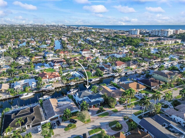 bird's eye view with a water view