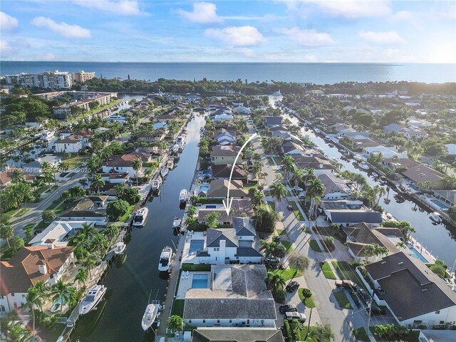 drone / aerial view featuring a water view